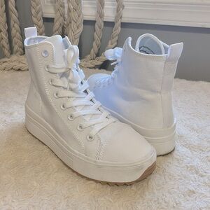 White lace-up high top sneakers